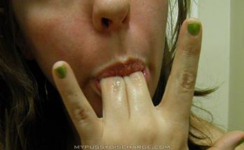 Horny milf licking grool on fingers after playtime 1